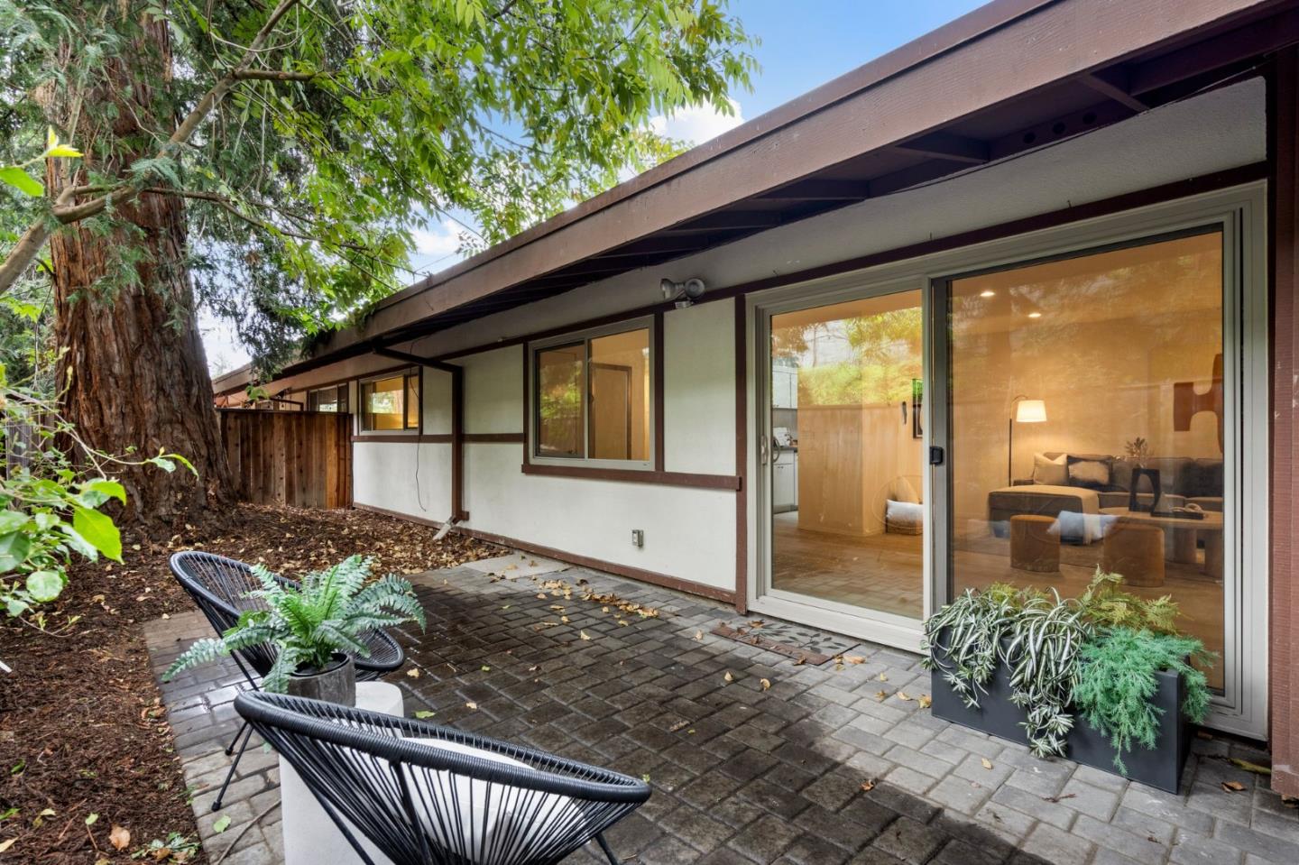 500 West Middlefield Road, Unit 101 Mountain View, CA 94043 - Photo 27 of 37 a house view with a seating space and garden