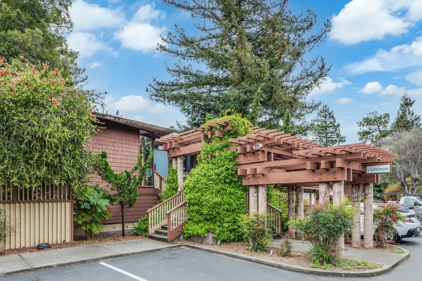 500 West Middlefield Road, Unit 101 Mountain View, CA 94043 - Photo 34 of 37 a view of house with a yard and potted plants