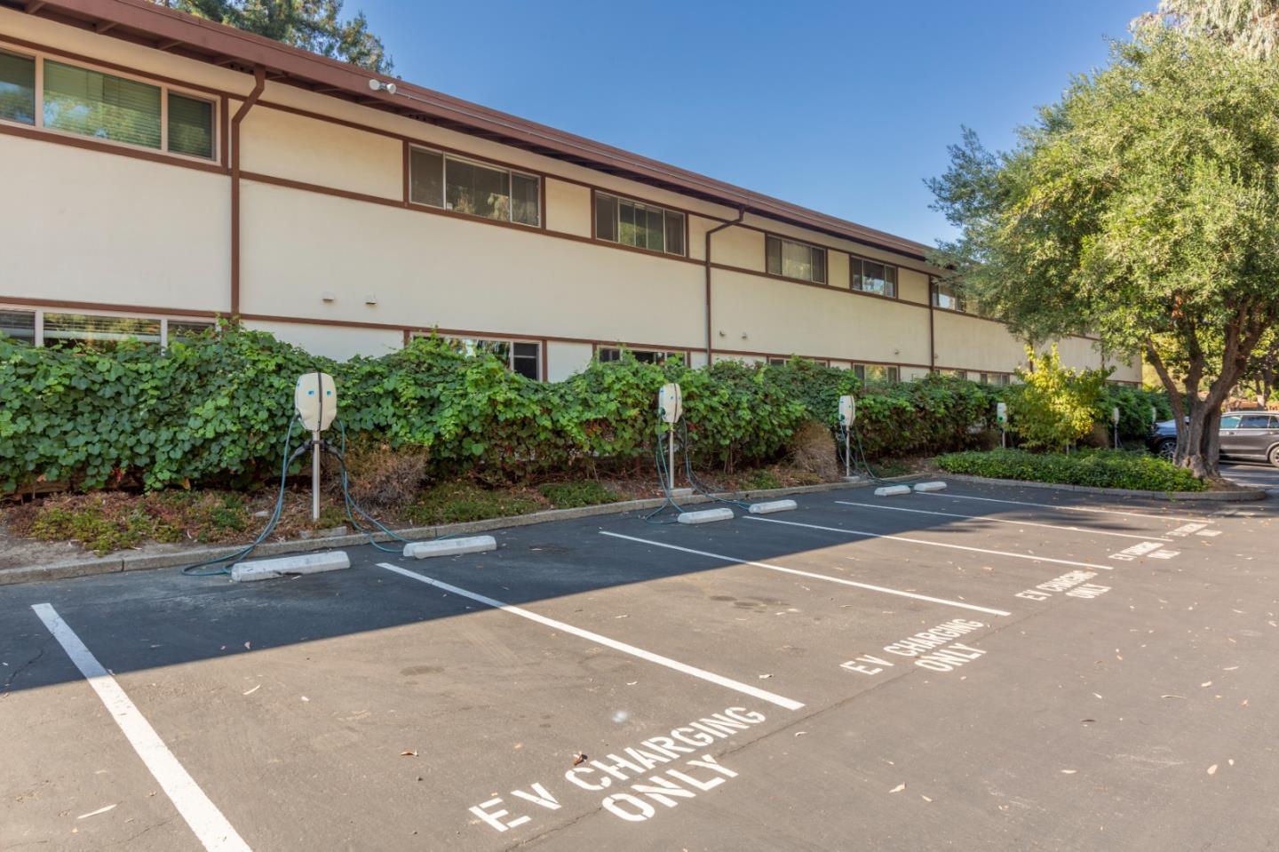 500 West Middlefield Road, Unit 101 Mountain View, CA 94043 - Photo 36 of 37 a front view of a building with garden