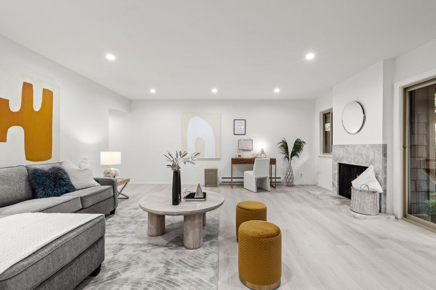500 West Middlefield Road, Unit 101 Mountain View, CA 94043 - Photo 5 of 37 a living room with furniture a fireplace and a window