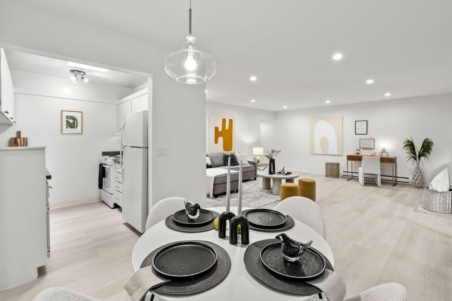 500 West Middlefield Road, Unit 101 Mountain View, CA 94043 - Photo 9 of 37 a kitchen with a table and chairs