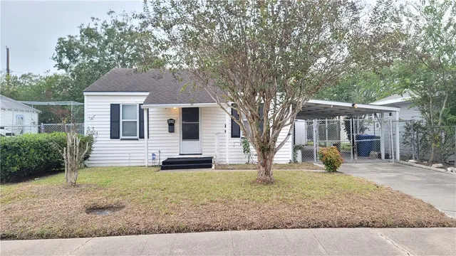 front view of house with a yard
