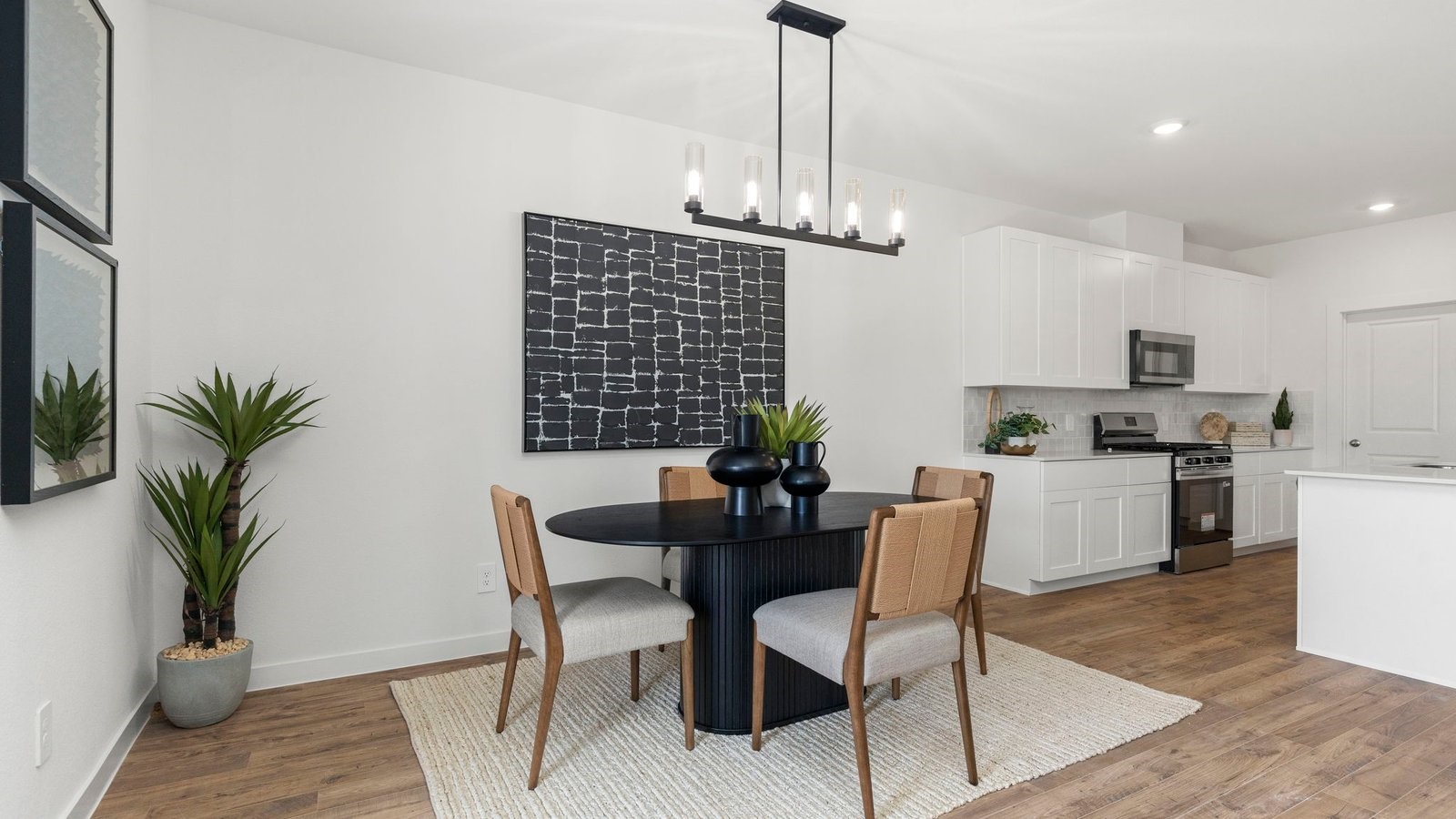3531 Blue Mockingbird Street Katy, TX 77494 - Photo 14 of 41 a view of a dining room with furniture window and wooden floor