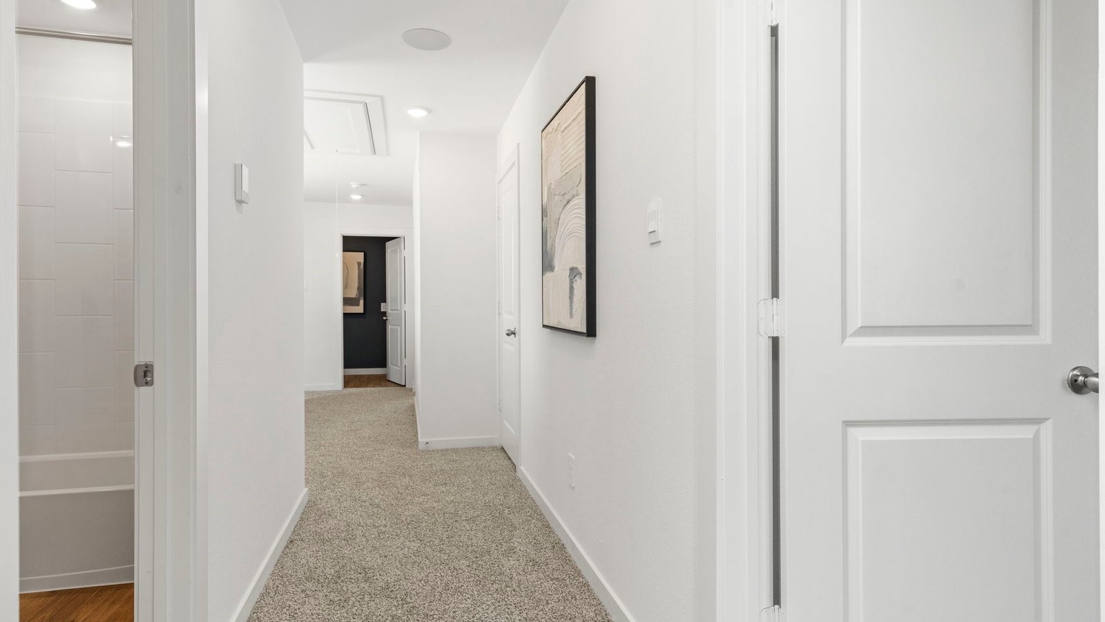 3531 Blue Mockingbird Street Katy, TX 77494 - Photo 20 of 41 a view of a hallway with wooden floor and staircase