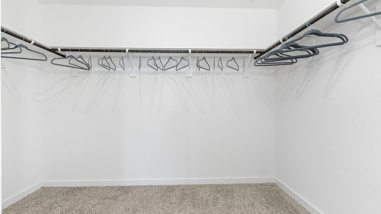 3531 Blue Mockingbird Street Katy, TX 77494 - Photo 28 of 41 a view of a room with racks on the wall