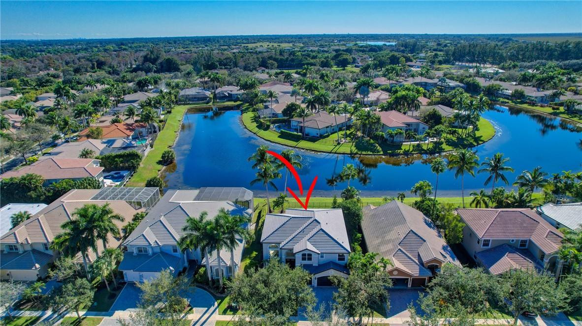 11750 Bayfield Drive Boca Raton, FL 33498 - Photo 2 of 70 an aerial view of residential houses with outdoor space and swimming pool