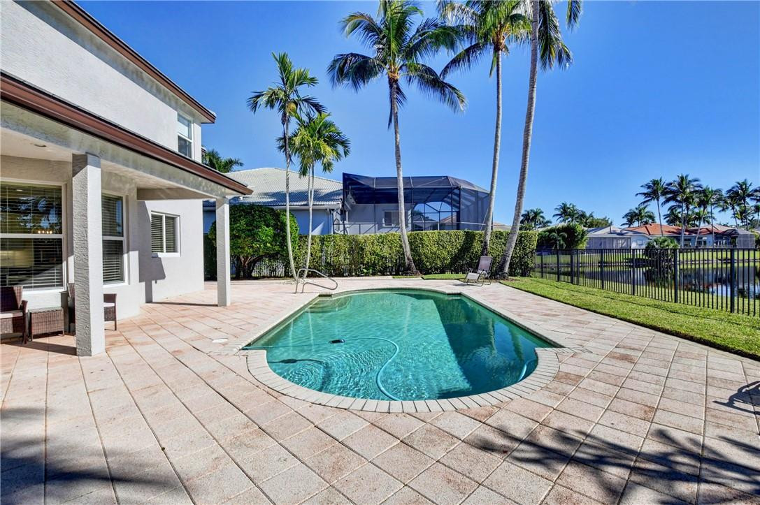 11750 Bayfield Drive Boca Raton, FL 33498 - Photo 39 of 70 a view of outdoor space yard and swimming pool