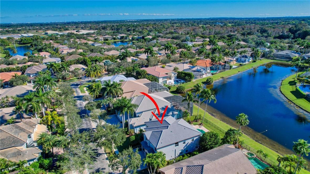 11750 Bayfield Drive Boca Raton, FL 33498 - Photo 4 of 70 an aerial view of a houses with a yard