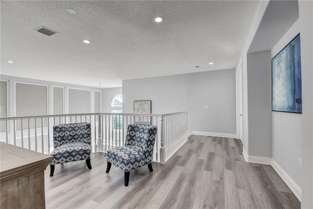 11750 Bayfield Drive Boca Raton, FL 33498 - Photo 50 of 70 a view of entryway with stairs and wooden floor