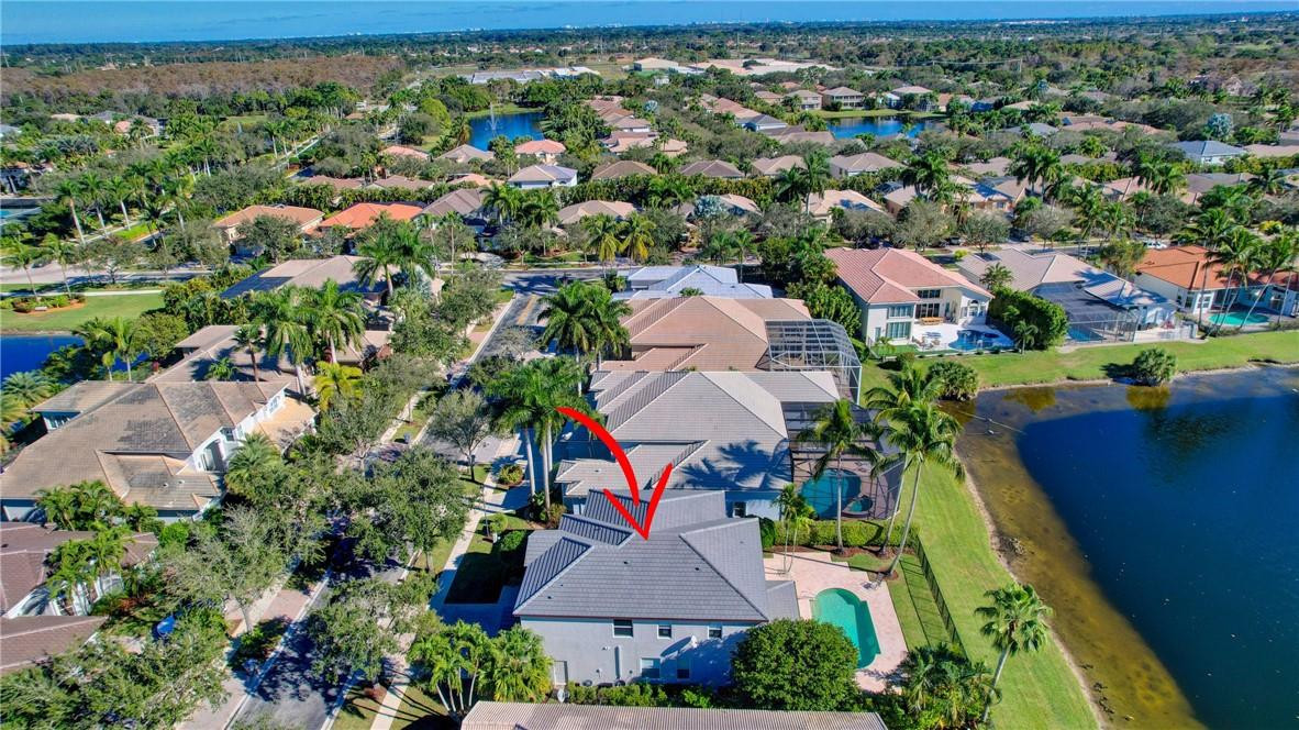 11750 Bayfield Drive Boca Raton, FL 33498 - Photo 5 of 70 an aerial view of a house with a garden