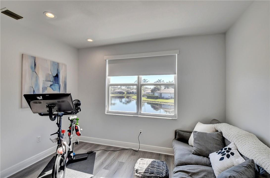 11750 Bayfield Drive Boca Raton, FL 33498 - Photo 55 of 70 a living room with furniture and a window