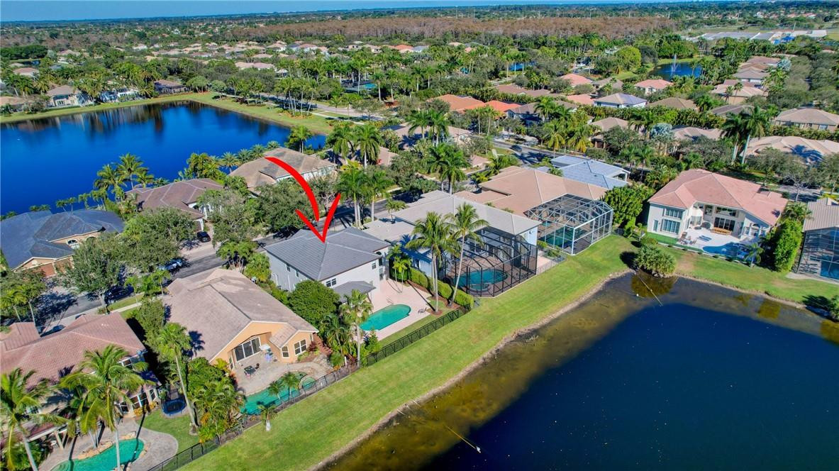 11750 Bayfield Drive Boca Raton, FL 33498 - Photo 6 of 70 an aerial view of a house with a garden
