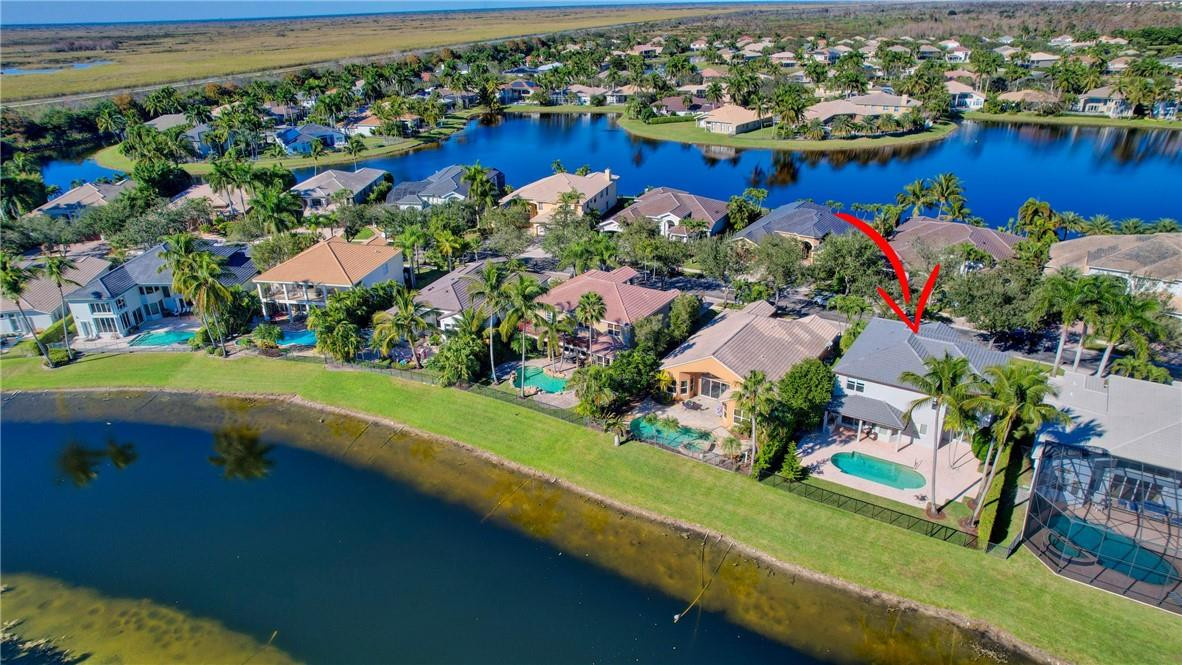 11750 Bayfield Drive Boca Raton, FL 33498 - Photo 8 of 70 an aerial view of residential houses with outdoor space and swimming pool