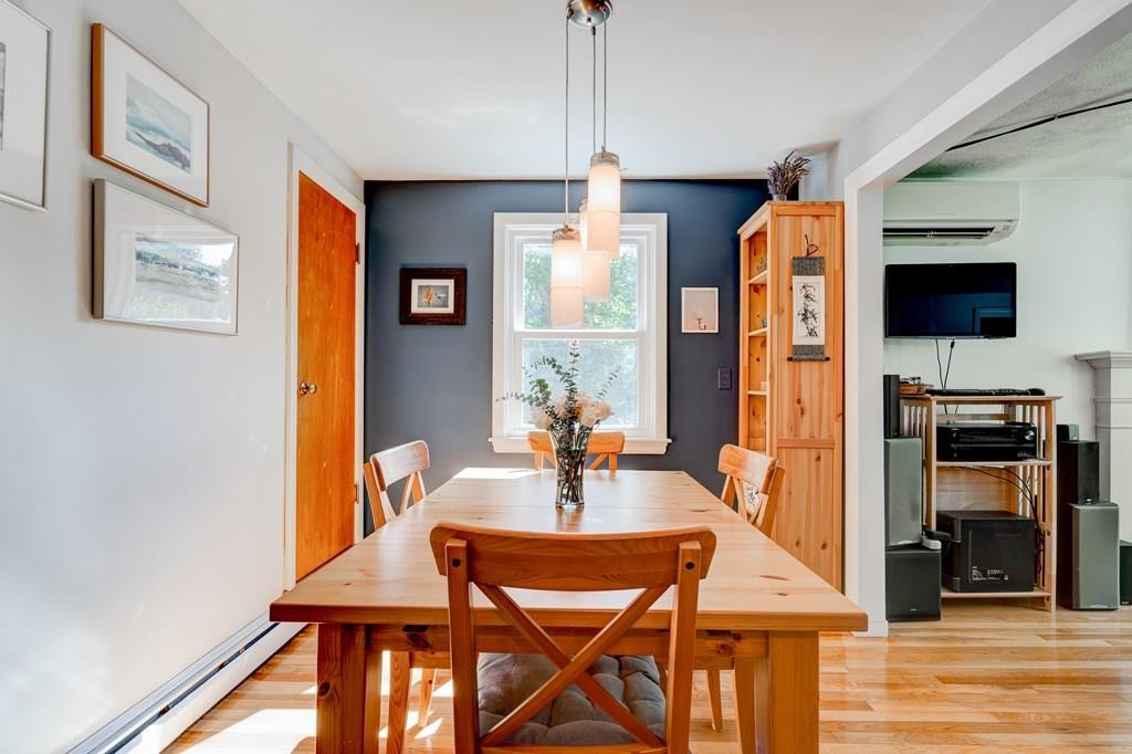 123 Harvard Road Littleton, MA 01460 - Photo 5 of 25 a dining room with furniture and window