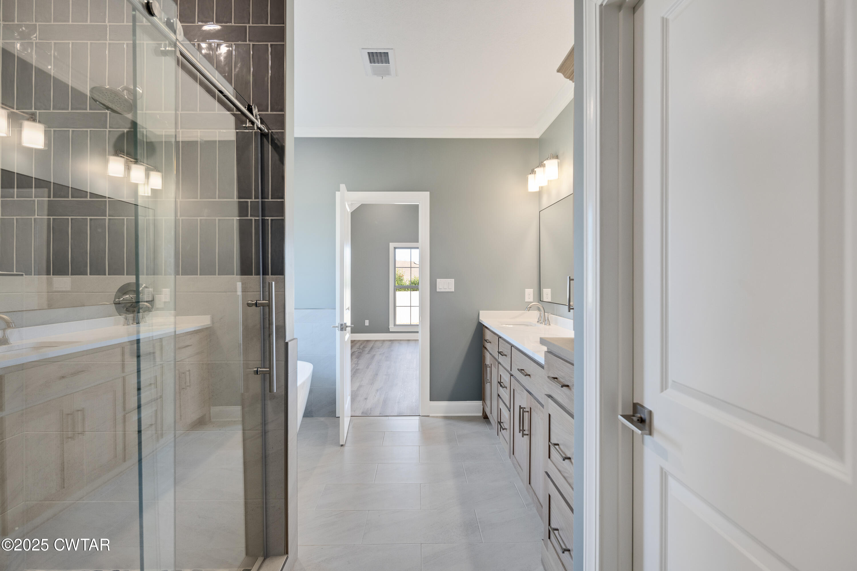 16 Enoch Cove Jackson, TN 38305 - Photo 18 of 28 a bathroom with a shower and a sink