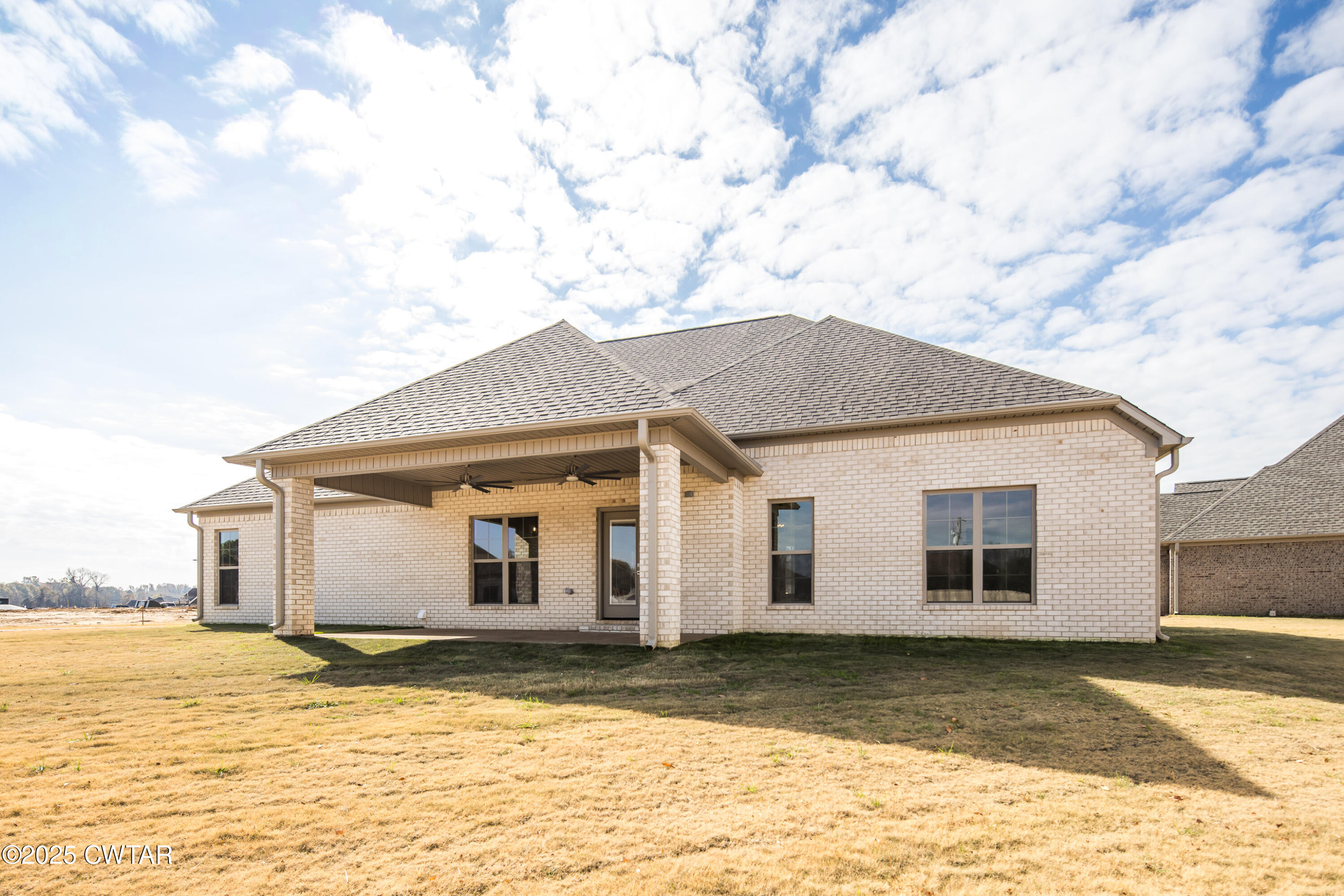 16 Enoch Cove Jackson, TN 38305 - Photo 28 of 28 a view of a house with a yard