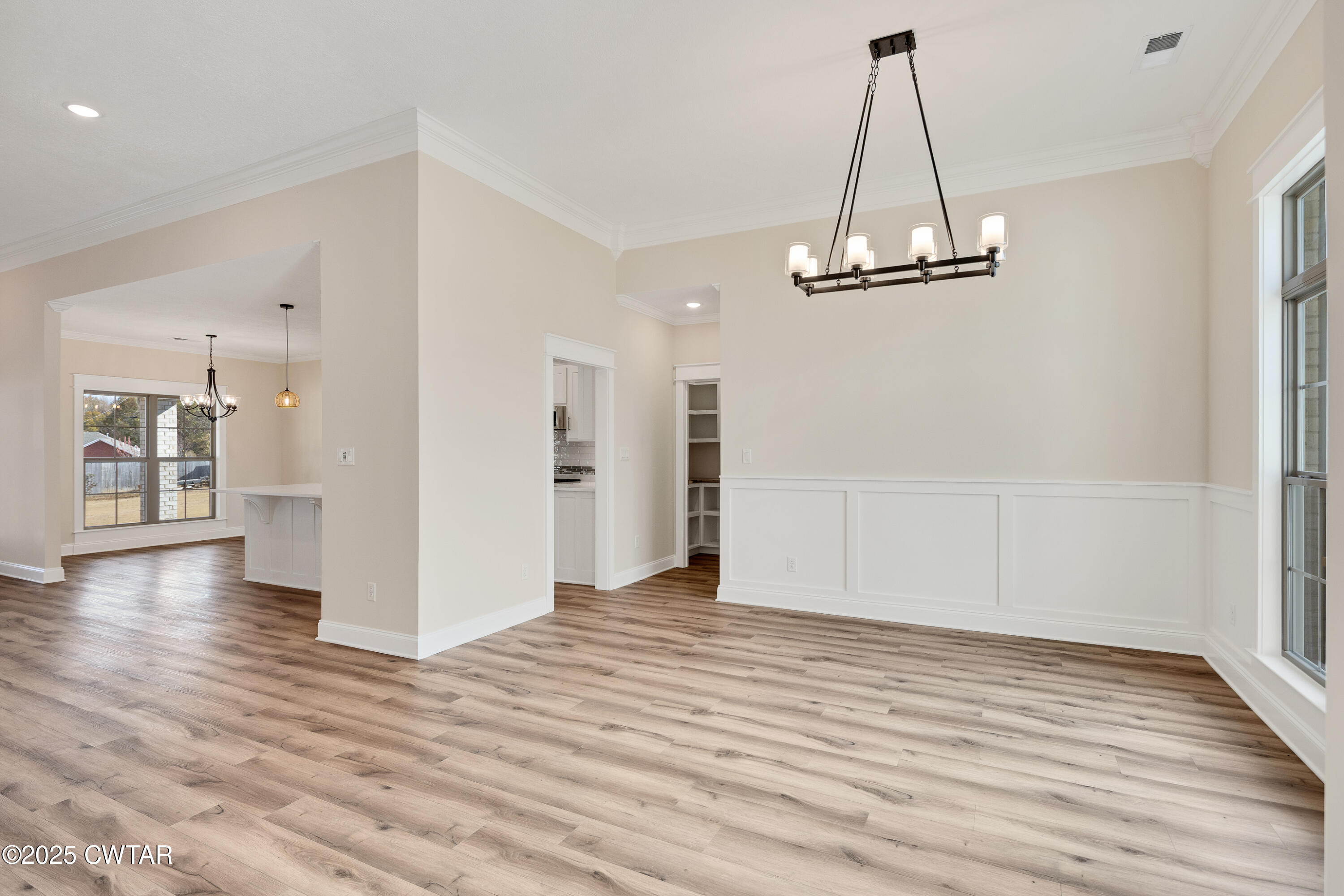 16 Enoch Cove Jackson, TN 38305 - Photo 4 of 28 a view of empty room with wooden floor