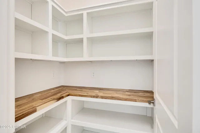 a view of an empty walk in closet