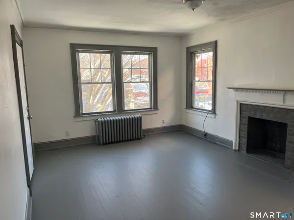 an empty room with windows