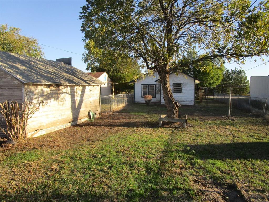 220 Southwest 5th Street Hamlin, TX 79520 - Photo 13 of 28 a view of a house with backyard