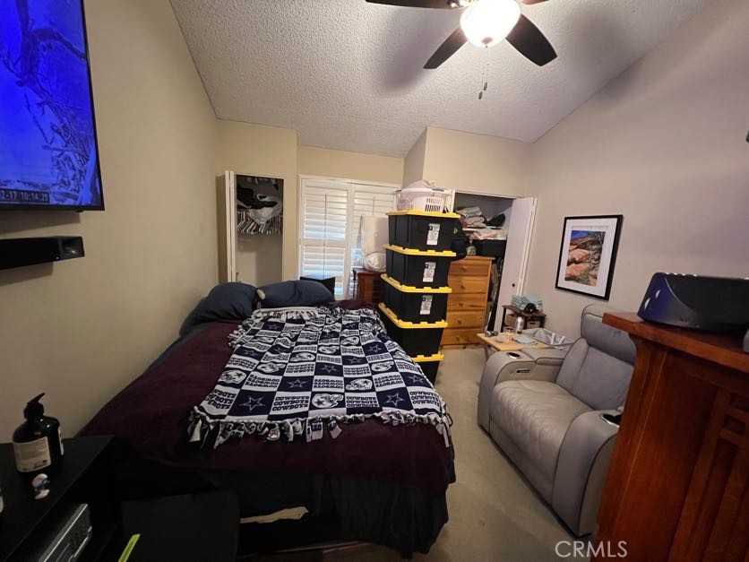 2733 Quail Ridge Circle, Unit 32 Fullerton, CA 92835 - Photo 16 of 25 a bedroom with a bed and wooden floor
