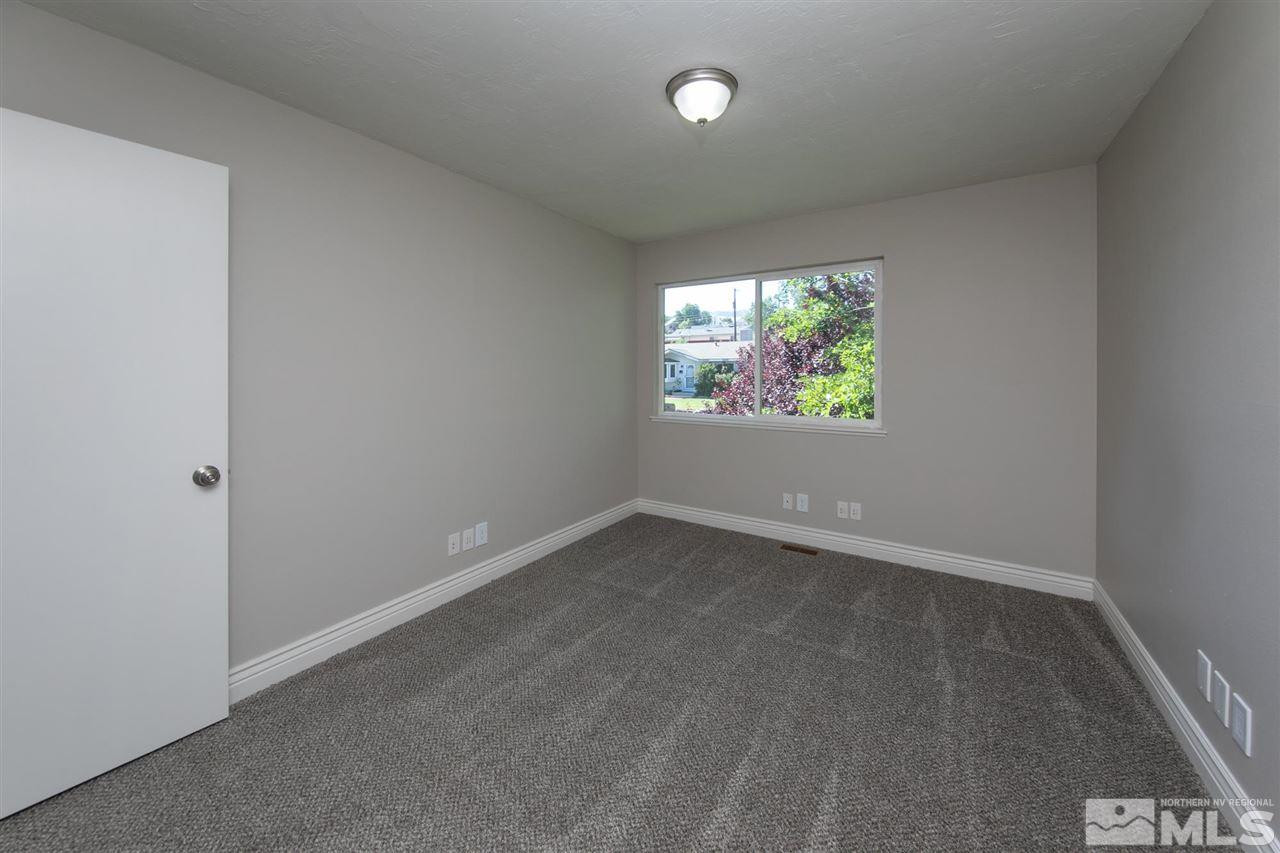 1520 Surf Way Reno, NV 89503 - Photo 17 of 32 an empty room with windows