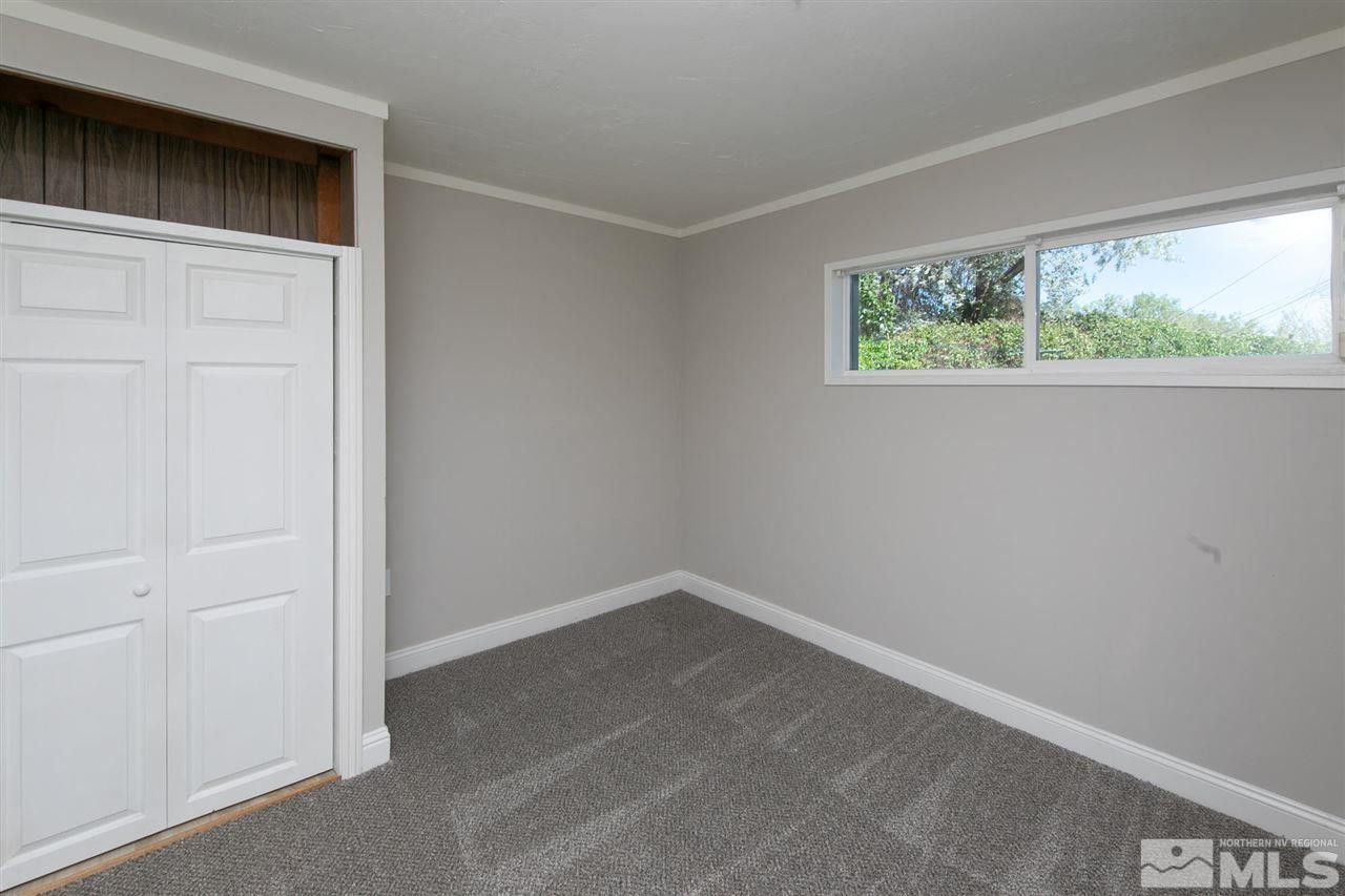 1520 Surf Way Reno, NV 89503 - Photo 25 of 32 an empty room with a window