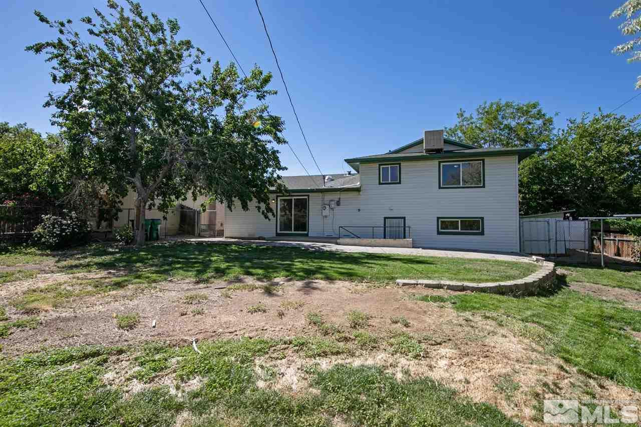 1520 Surf Way Reno, NV 89503 - Photo 30 of 32 a view of a house with a yard