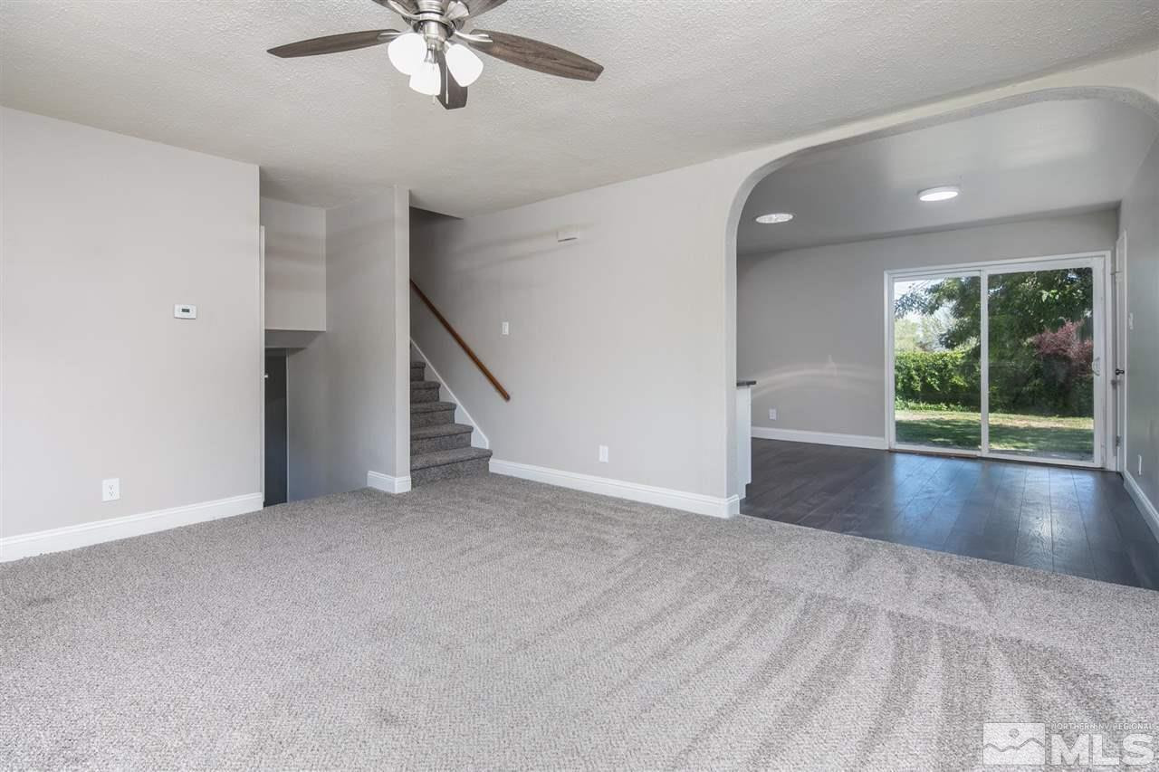 1520 Surf Way Reno, NV 89503 - Photo 6 of 32 a view of a livingroom with a ceiling fan and window