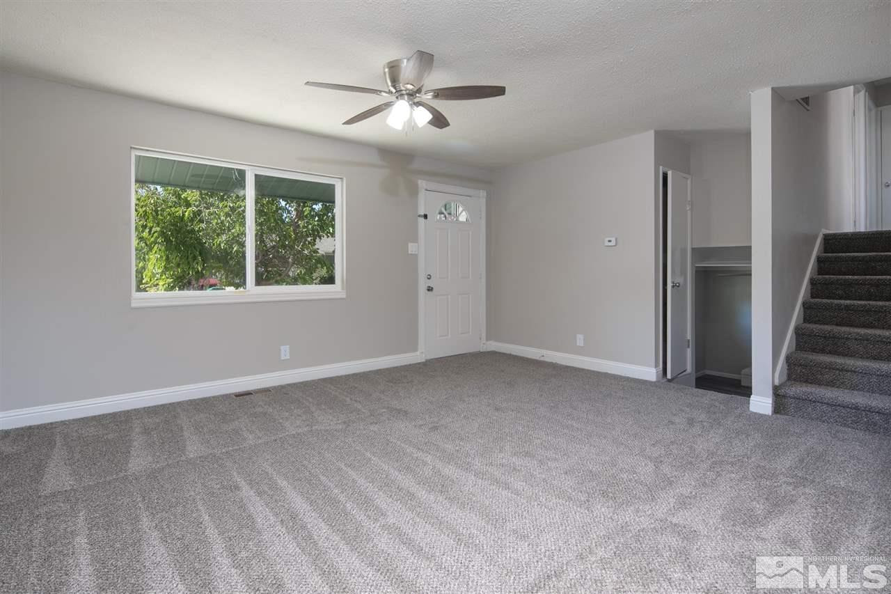 1520 Surf Way Reno, NV 89503 - Photo 7 of 32 a view of an empty room with a window
