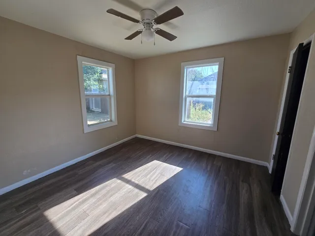 a bathroom with a tub toilet and sink
