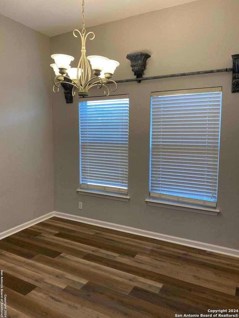8404 Forest Ridge Drive San Antonio, TX 78239 - Photo 11 of 18 a view of a livingroom with a chandelier