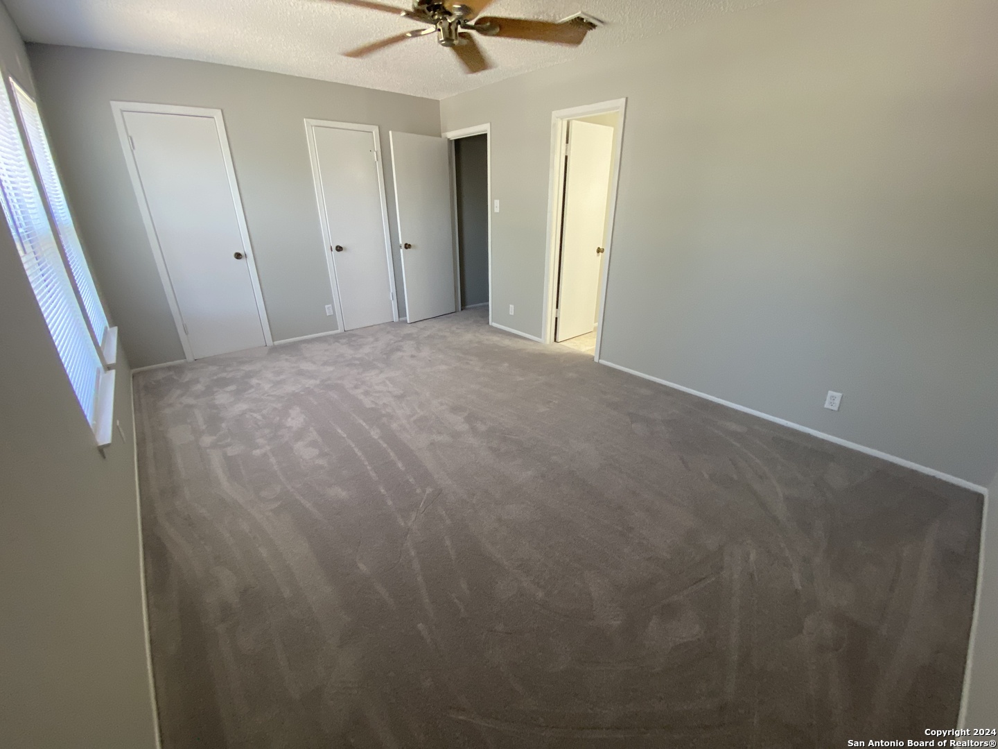 8404 Forest Ridge Drive San Antonio, TX 78239 - Photo 3 of 18 a view of a room with a ceiling fan