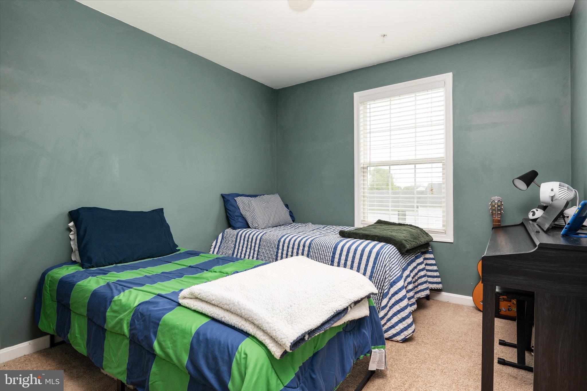 200 Newtown Road Chester, MD 21619 - Photo 28 of 50 a bedroom with a bed and a window