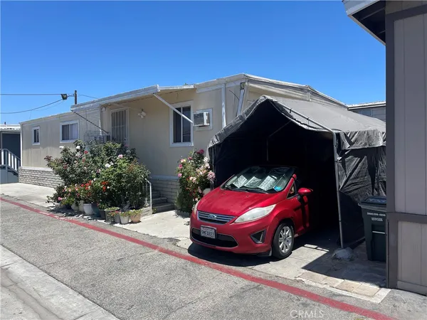 a car parked in front of a house