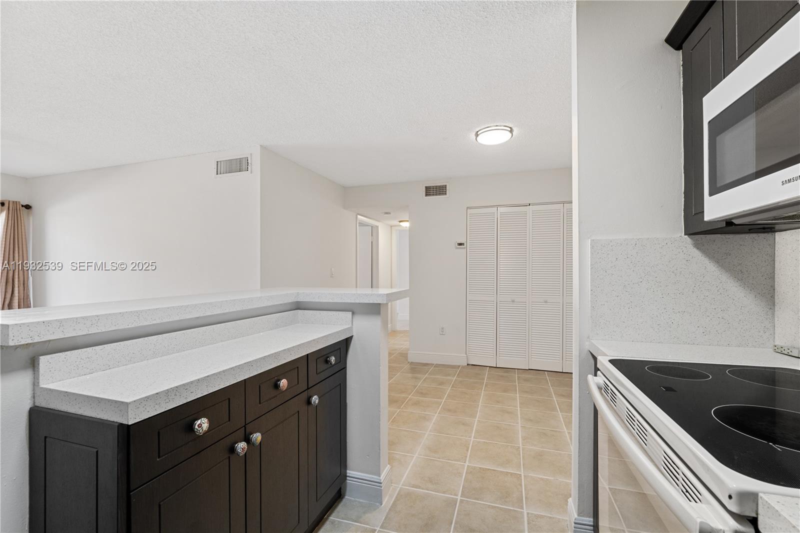 7200 Northwest 179th Street, Unit 105 Hialeah, FL 33015 - Photo 5 of 24
