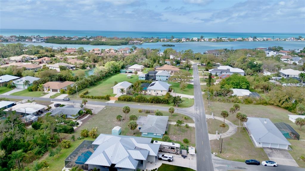 223 Roberts Road Nokomis, FL 34275 - Photo 26 of 27 an aerial view of a city with lots of residential buildings lake and ocean view