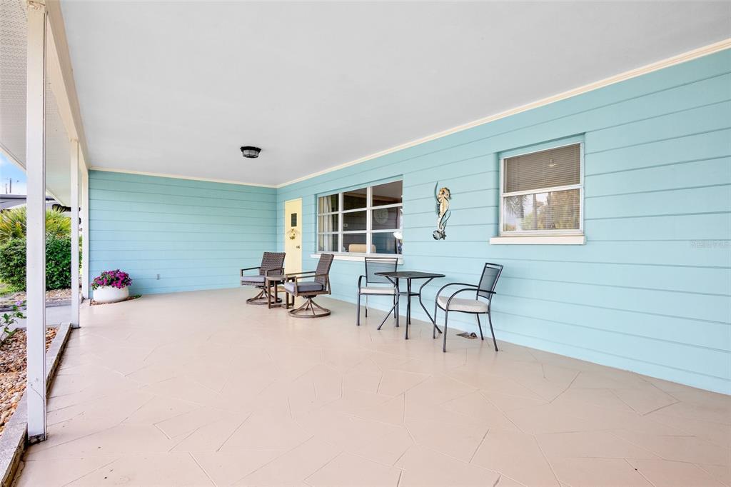 223 Roberts Road Nokomis, FL 34275 - Photo 4 of 27 a view of a room with furniture and a window