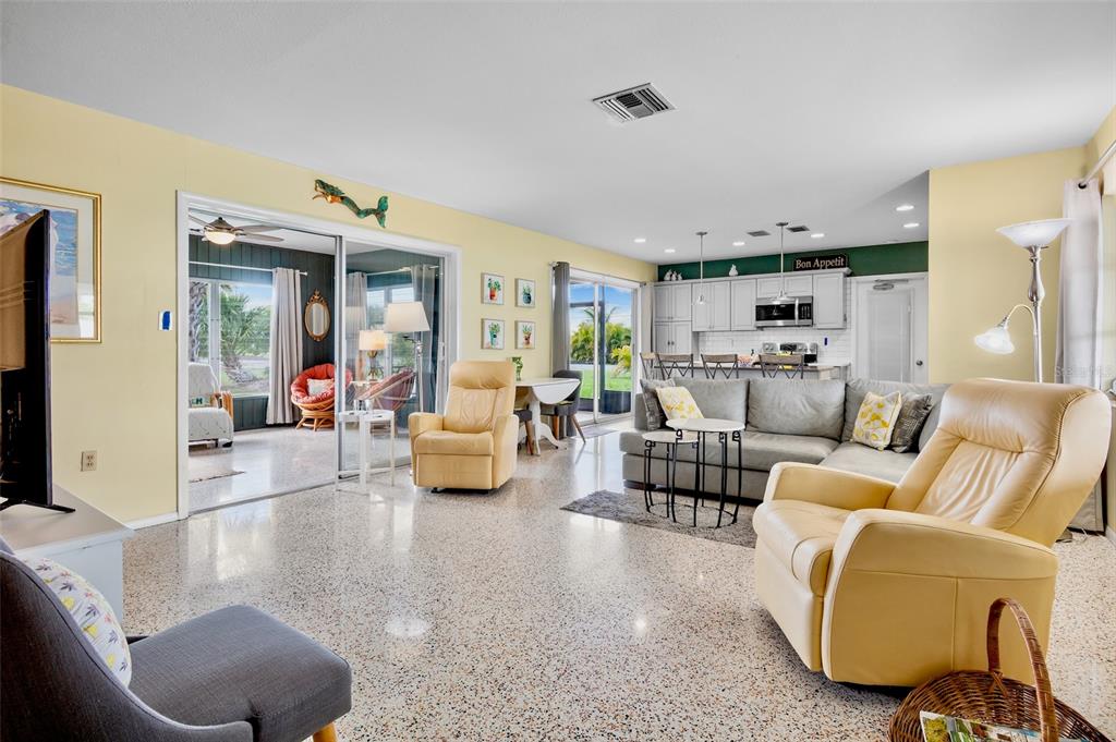 223 Roberts Road Nokomis, FL 34275 - Photo 5 of 27 a living room with furniture and a large window