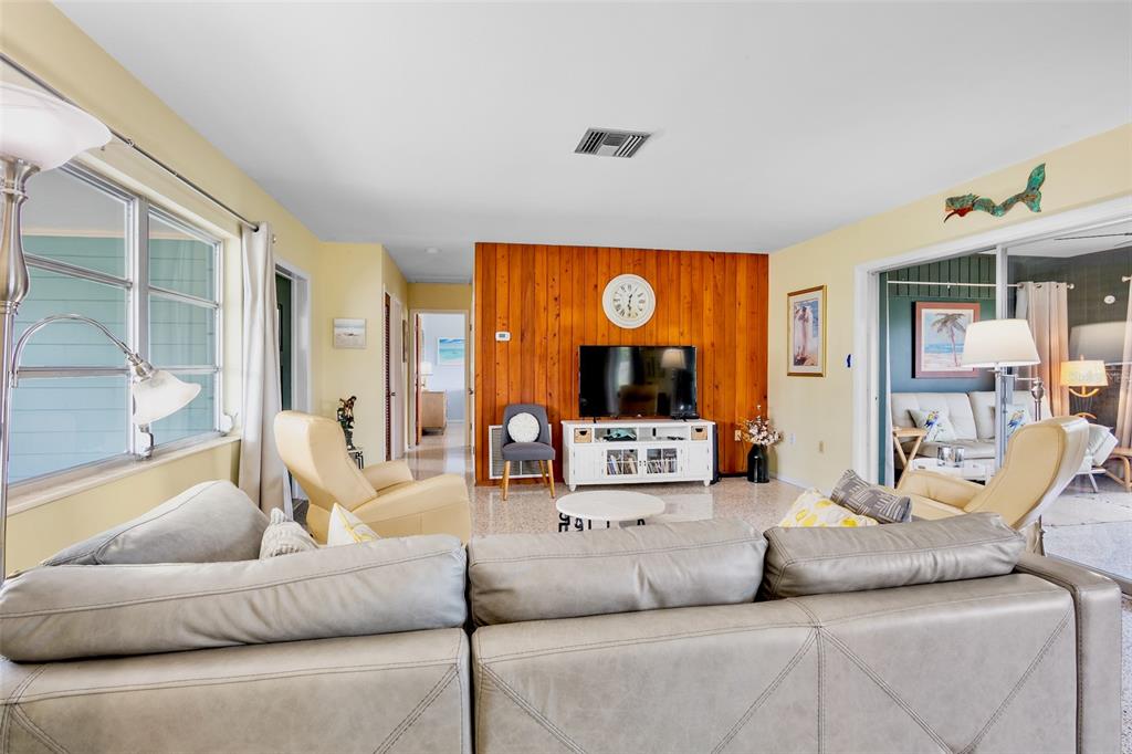 223 Roberts Road Nokomis, FL 34275 - Photo 7 of 27 a living room with furniture and a large window