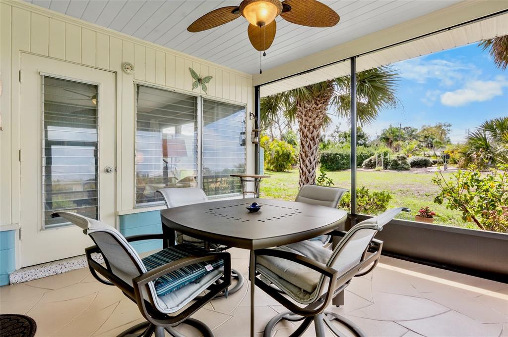 223 Roberts Road Nokomis, FL 34275 - Photo 9 of 27 a dining room with furniture and window