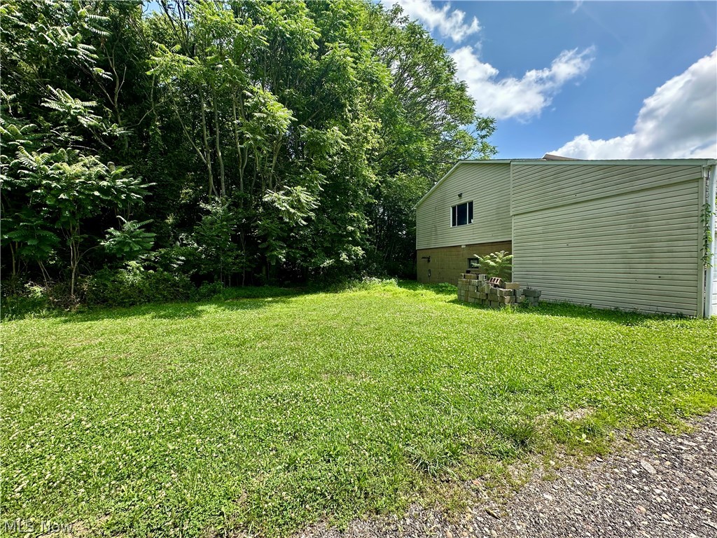 28 Richter Road Colliers, WV 26035 - Photo 28 of 38 Yard featuring side of garage