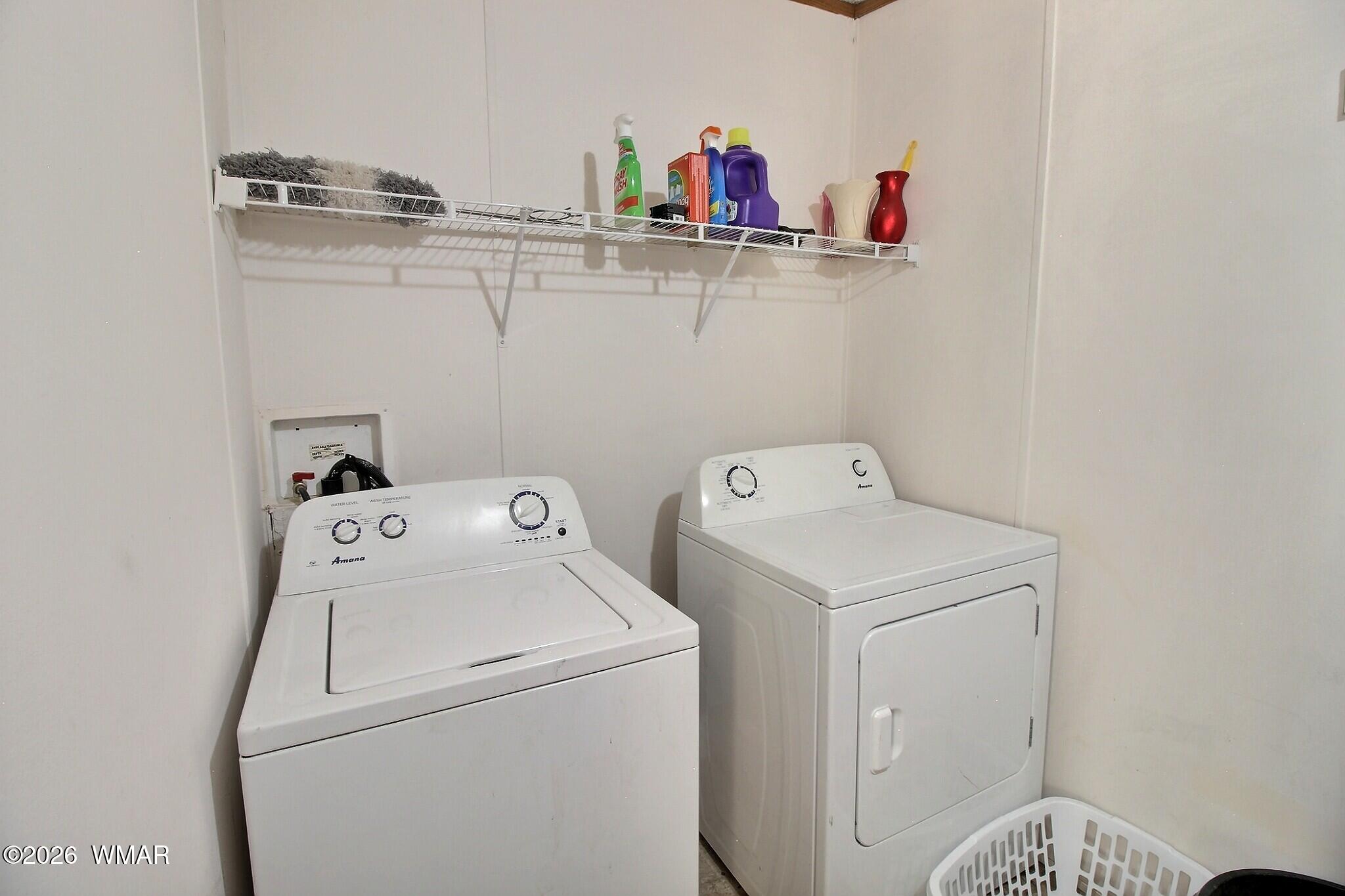 4710 Hay Hollow Road Snowflake, AZ 85937 - Photo 15 of 20 a utility room with dryer and washer