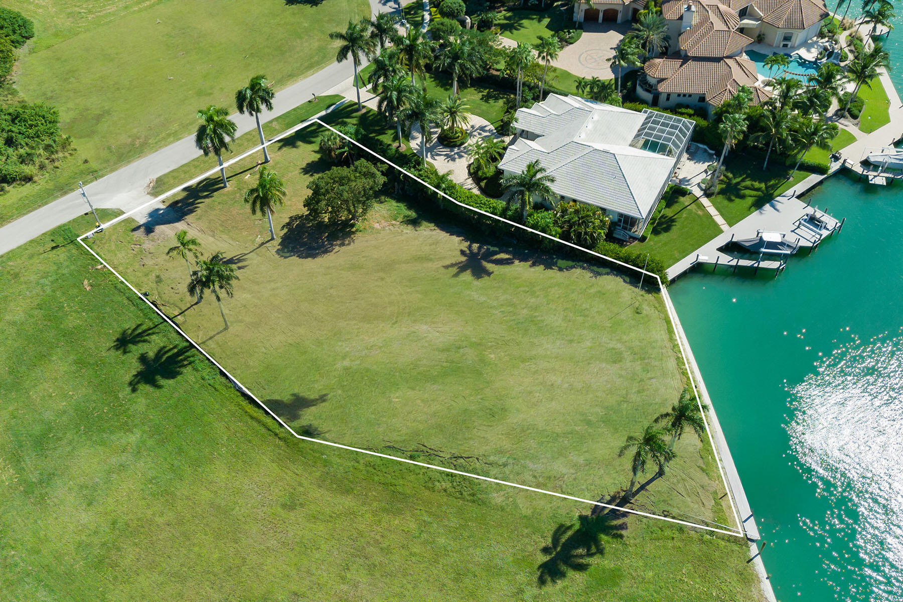 1028 West Inlet Drive Marco Island, FL 34145 - Photo 11 of 13 a view of a yard