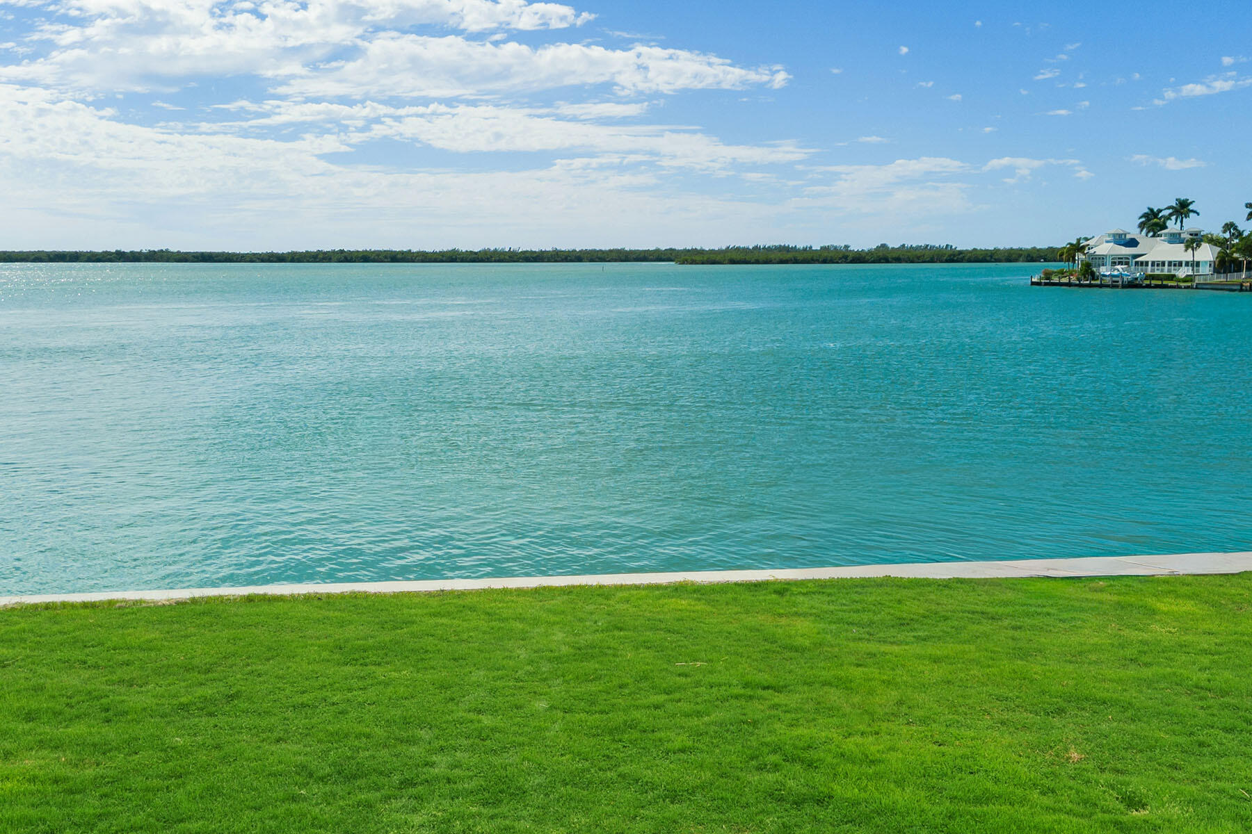 1028 West Inlet Drive Marco Island, FL 34145 - Photo 5 of 13 a view of a field with an ocean beach