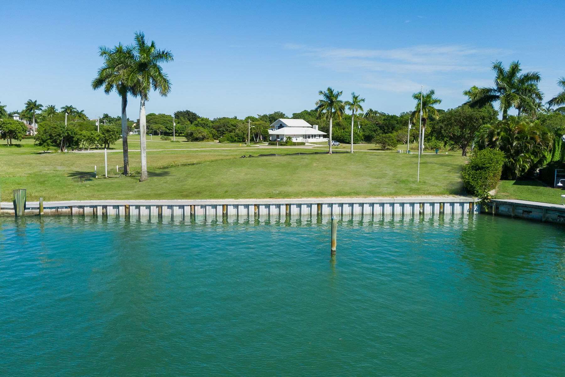 1028 West Inlet Drive Marco Island, FL 34145 - Photo 6 of 13 a garden with a lake view