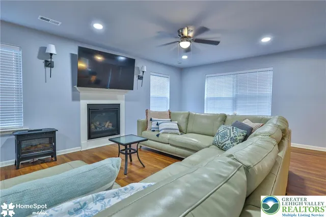 a view of a livingroom with wooden floor