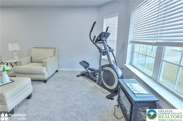 a bathroom with a sink a mirror and a shower