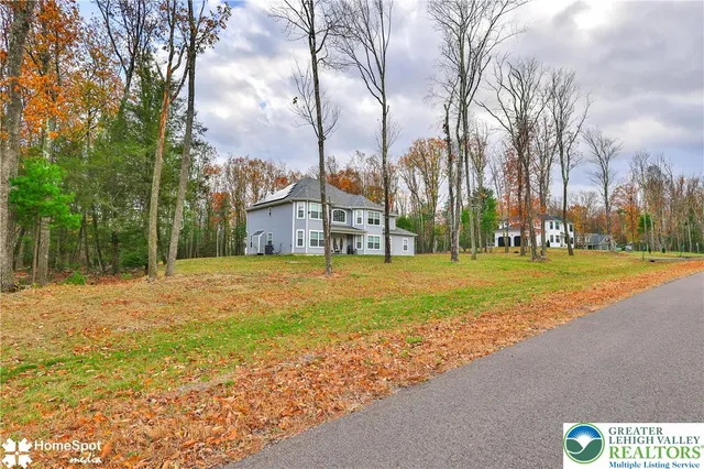 a house with trees in front of it