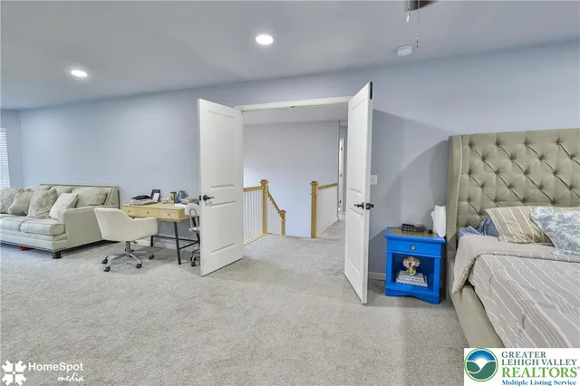 a bathroom with a sink a mirror and a shower